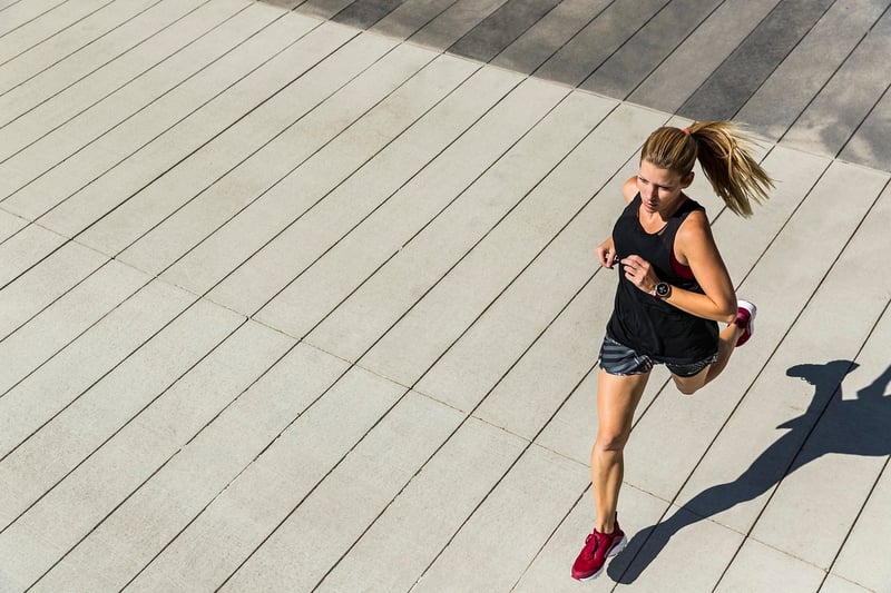 Woman running on a trail