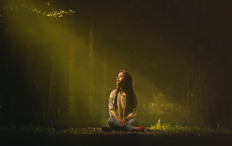Woman practicing yoga in nature